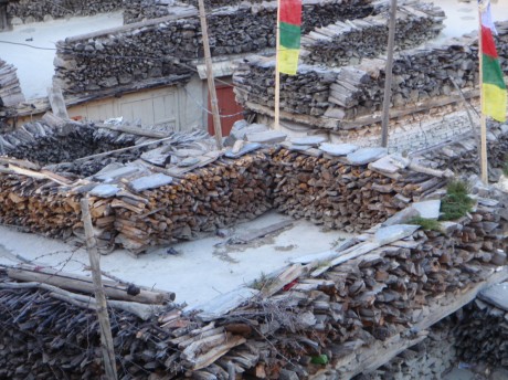 Wood drying on roofs in Marhpa